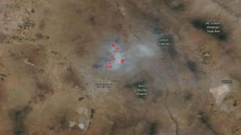 NASA captures 63-mile smoke trail from massive Arizona bush fire