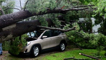 Severe weather knocks out power to more than 500K in Midwest, flips semi-trucks; storm risk moves East