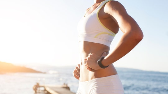 Woman in skimpy outfit performing squats near religious ceremony on Bali beach is slammed: 'Inappropriate'