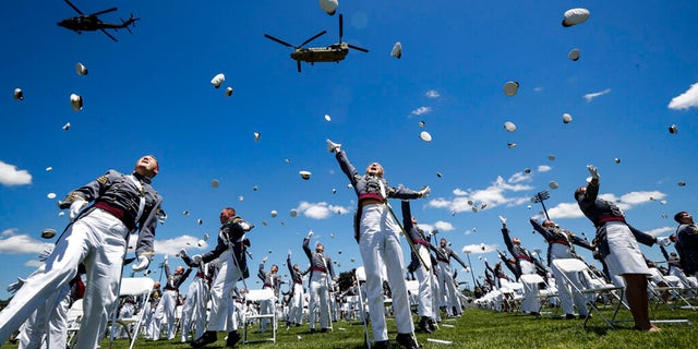 United States Military Academy graduating cadets celebrate at the end of their commencement ceremonies, June 13, 2020, in West Point, New York.