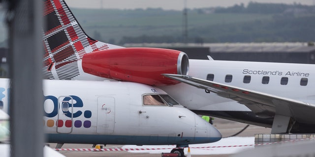 Authorities are investigating an incident at Aberdeen Airport in Scotland when a former Flybe jet collided with a Loganair plane.