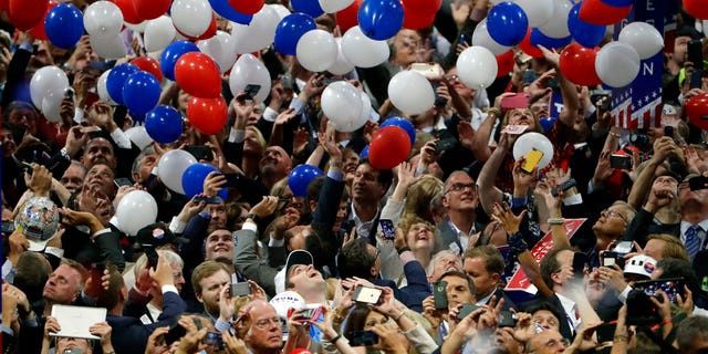 Confetti and balloons fall during celebrations after Republican presidential candidate Donald Trump's acceptance speech on the final day of the Republican National Convention in Cleveland. July 21, 2016. (AP Photo/Matt Rourke, File)
