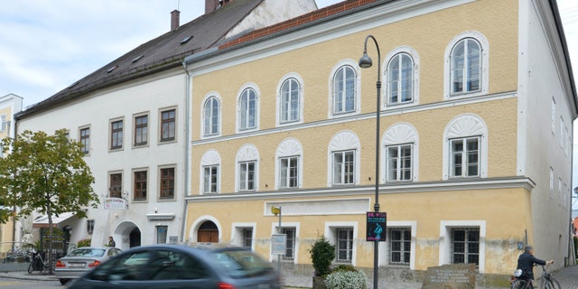 This Sept. 27, 2012 file picture shows an exterior view of Adolf Hitler's birth house, front, in Braunau am Inn, Austria. The birth house of Adolf Hitler will become a police station Austrian interior minister Karl Nehammer said, as he presents the redesign of the building at a news conference in Vienna Tuesday, June 2, 2020.