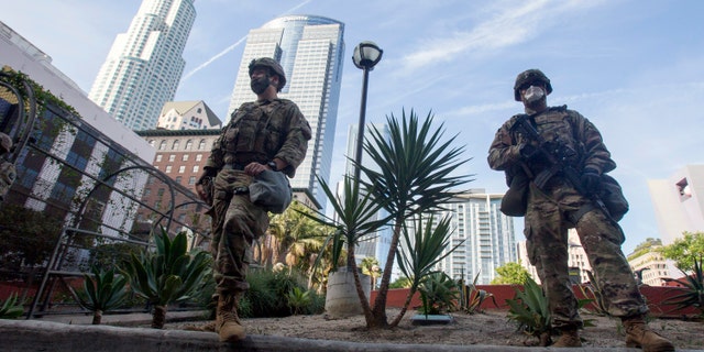 Members of the California National Guard patrol in Los Angeles on May 31, 2020. (AP Photo/Ringo H.W. Chiu, File)