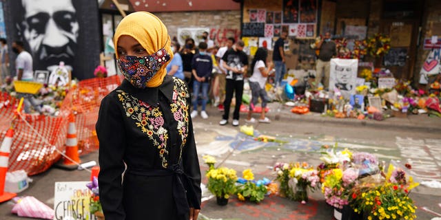 U.S. Rep. Ilhan Omar, along with members of the United States Congressional Black Caucus, visit the site where George Floyd died Thursday, June 4, 2020 in Minneapolis. Floyd who died after being restrained by Minneapolis police officers on May 25. (Anthony Souffle/Star Tribune via AP)