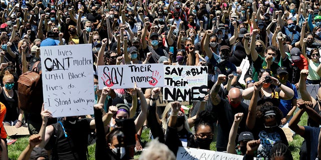 Thousands of people gather for the Chicago March for Justice in honor of George Floyd at Chicago's Union Park Saturday, June 6, 2020, in Chicago. (AP Photo/Nam Y. Huh)