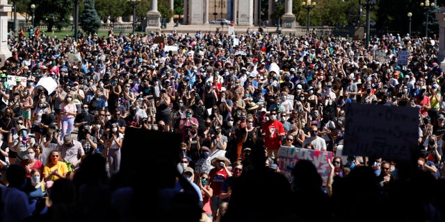 Demonstrators crowd into Civic Center Park in Denver, June 7, 2020. (Associated Press)