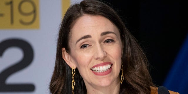 New Zealand Prime Minister Jacinda Ardern addresses a press conference where she announced New Zealand will drop to Covid-19 alert level 1 at midnight tonight, in Wellington, New Zealand, Monday, June 8, 2020. (Mark Mitchell/New Zealand Herald via AP)