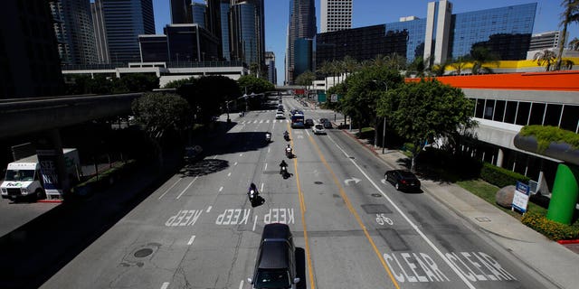 Contracts reveal this county is paying millions to PR firms to guide coronavirus messaging 2 A hearse leads a ceremonial burial procession Monday, June 8, 2020, in Los Angeles during a protest over the death of George Floyd, who died May 25 after he was restrained by Minneapolis police.