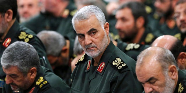 Revolutionary Guard Gen. Qassem Soleimani, center, attends a meeting in Tehran, Iran, in September 2016. (Office of the Iranian Supreme Leader via AP, File)