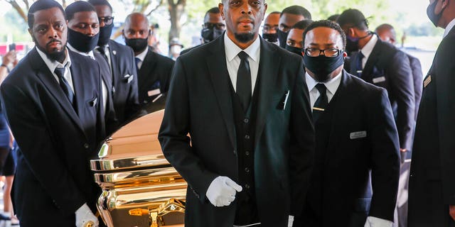 Pallbearers bringing the coffin into The Fountain of Praise church in Houston for the funeral for George Floyd on Tuesday.