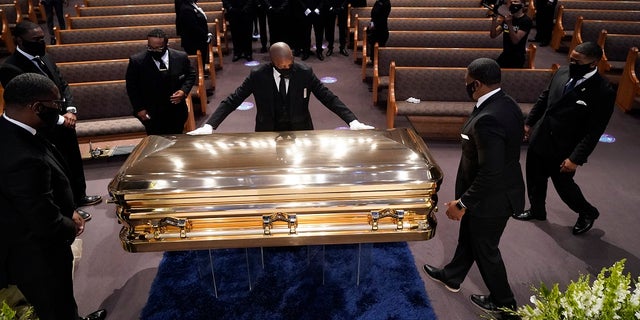 The casket of George Floyd is placed in the chapel during a funeral service at Fountain of Praise church, June 9, 2020, in Houston.