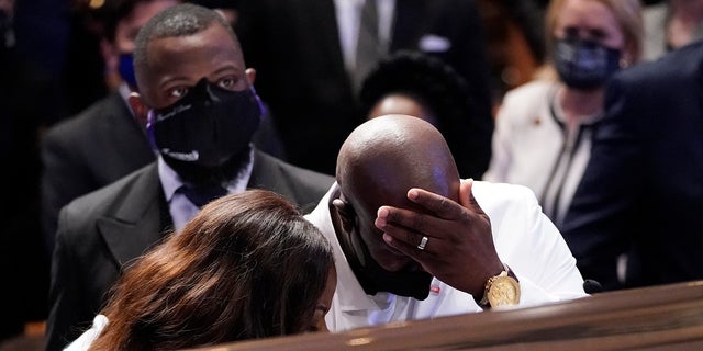 Philonise Floyd, George Floyd's brother, pausing at the casket during the funeral service. (AP Photo/David J. Phillip, Pool)