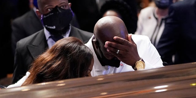 Philonise Floyd, George Floyd's brother, pausing at the casket during the funeral service. (AP Photo/David J. Phillip, Pool)