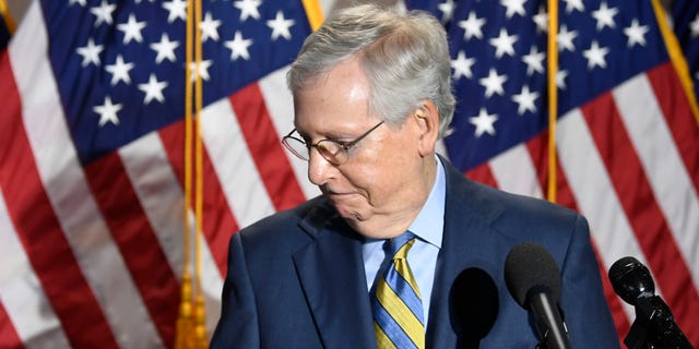 Senate Majority Leader Mitch McConnell of Ky., steps away from the microphone as he speak to reporters following the weekly Republican policy luncheon on Capitol Hill in Washington, Tuesday, June 9, 2020. (AP Photo/Susan Walsh)