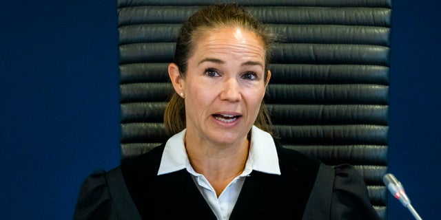 District court Judge Annika Lindström announces the verdict against Philip Manshaus at the district court of Baerum and Sandvika, Norway, on the last day of his trial, Thursday, Jun 11, 2020. Manshaus, a Norwegian man, is charged with murder and terrorism in the killing of his stepsister and the storming of an Oslo mosque. (Håkon Mosvold Larsen/NTB Scanpix via AP, POOL)