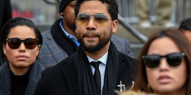 Former "Empire" actor Jussie Smollett leaves the Leighton Criminal Courthouse in Chicago, after an initial court appearance on a new set of charges alleging that he lied to police about being targeted in a racist and homophobic attack in downtown Chicago early last year.