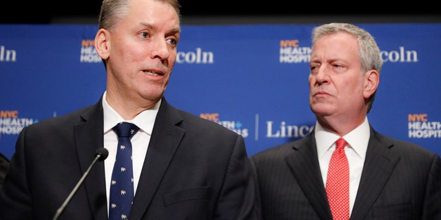 New York City Police Commissioner Dermot Shea, left, speaks alongside Mayor Bill de Blasio during a news conference in New York. New York City’s police department is disbanding NYPD's anti-crime unit, the controversial unit involved in Eric Garner’s 2014 chokehold death, Commissioner Dermot Shea said Monday, June 15, 2020 amid a nationwide reckoning for policing in the wake of George Floyd’s death last month in Minneapolis .(AP Photo/John Minchillo, File)