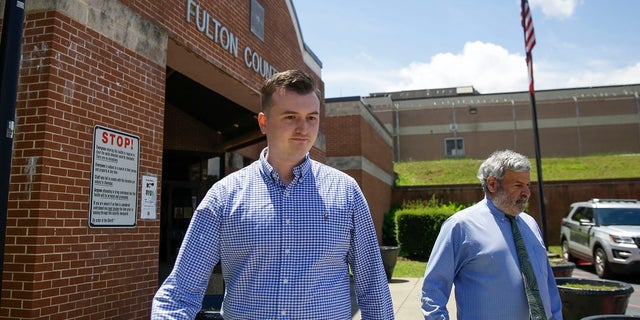 Atlanta Police officer Devin Brosnan walks out following his release from the Fulton County Jail on Thursday last week in Atlanta. Authorities have charged him with four counts, including aggravated assault in the shooting death of Rayshard Brooks. The Fulton County District Attorney said Brosnan stood on Brooks' shoulder as he struggled for his life. (AP Photo/Brynn Anderson)