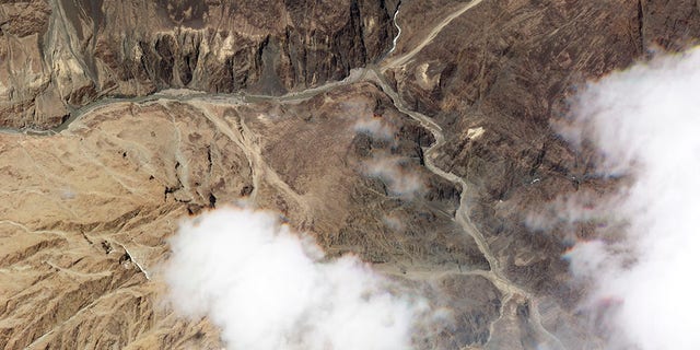 This June 18, 2020, satellite photo released by Planet Labs, shows the reported site of a fatal clash between Indian and Chinese troops in the Galwan River Valley in the Ladakh region near the Line of Actual Control, BKalong their disputed border high in the Himalayas. (Planet Labs via AP)