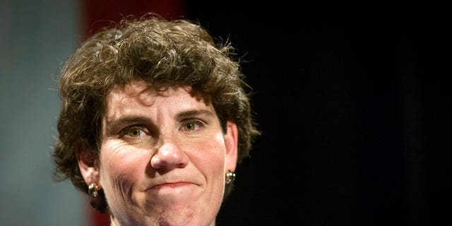 FILE - In this Nov. 6, 2018, file photo, Amy McGrath speaks to supporters in Richmond, Ky. McGrath and Eliot Engel live hundreds of miles apart in states with dramatically different politics. Yet they are both the preferred candidates of the Democratic Party’s Washington establishment as voters in Kentucky and New York decide their congressional primary elections on Tuesday. And both may be in trouble. (AP Photo/Bryan Woolston, File)