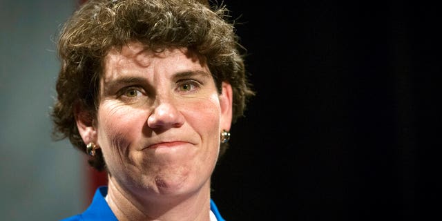 FILE - In this Nov. 6, 2018, file photo, Amy McGrath speaks to supporters in Richmond, Ky. McGrath and Eliot Engel live hundreds of miles apart in states with dramatically different politics. Yet they are both the preferred candidates of the Democratic Party’s Washington establishment as voters in Kentucky and New York decide their congressional primary elections on Tuesday. And both may be in trouble. (AP Photo/Bryan Woolston, File)