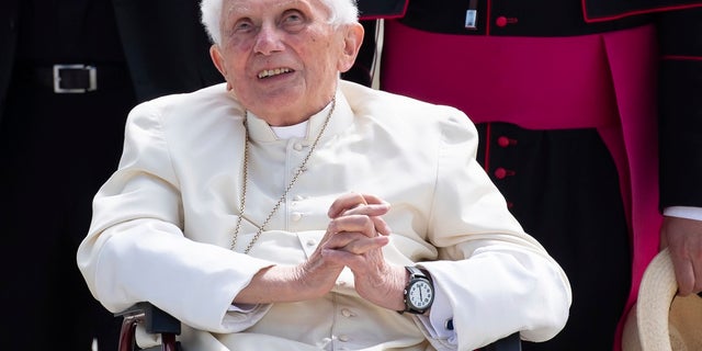 Emeritus Pope Benedict XVI arrives for his departure at Munich Airport in Freising, Germany,  after a four-day visit with his ailing elder brother.