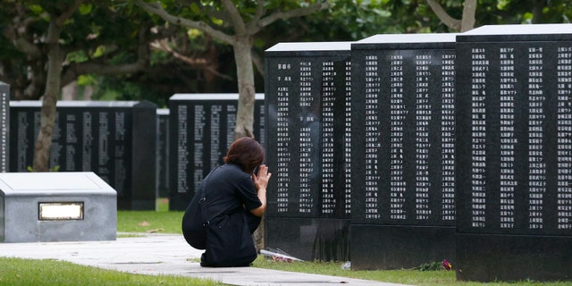 Okinawan people find it unacceptable that their land is still occupied by a heavy U.S. military presence even 75 years after World War II. They have asked the central government to do more to reduce their burden, and Prime Minister Shinzo Abe's government repeatedly say it is mindful of their feelings, but the changes are slow to come. (Kyodo News via AP)