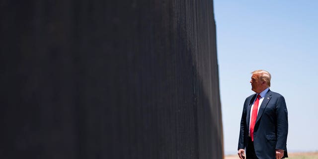 President Donald Trump tours a section of the border wall, Tuesday, June 23, 2020, in San Luis, Ariz. (AP Photo/Evan Vucci)