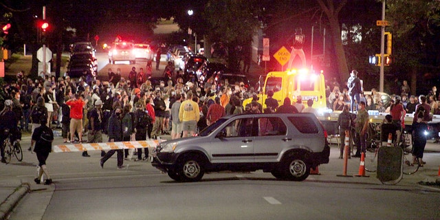 Protesters block traffic at an intersection an intersection near Capitol Square in Madison, Wis. Tuesday, June 23, 2020. (Emily Hamer/Wisconsin State Journal via AP)