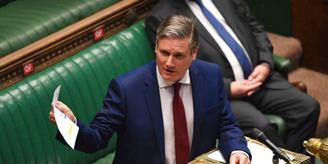 In this handout photo provided by UK Parliament, Britain's Labour leader Keir Starmer speaks during Prime Minister's Questions in the House of Commons, London, Wednesday, June 24, 2020. (Jessica Taylor/UK Parliament via AP)