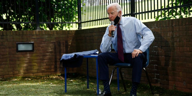 Democratic presidential candidate, former Vice President Joe Biden speaks with families who have benefited from the Affordable Care Act, Thursday, June 25, 2020, in Lancaster, Pa. (Associated Press)