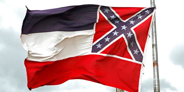 A Mississippi state flag flying outside the Capitol in Jackson, Miss. 
