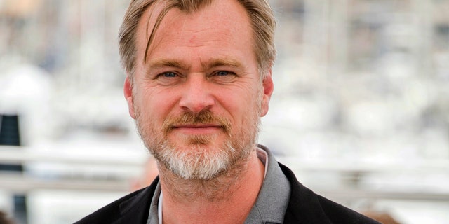 FILE - In this May 12, 2018, file photo, director Christopher Nolan poses during a photocall at the 71st international film festival in Cannes, southern France.