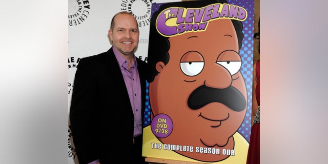 FILE - In this Sept. 23, 2010 file photo, actor and show co-creator Mike Henry appears with signage for his animated series 'The Cleveland Show' at a panel discussion at The Paley Center for Media in Beverly Hills, Calif.