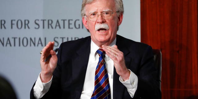 FILE - In this Sept. 30, 2019, file photo, former National security adviser John Bolton gestures while speakings at the Center for Strategic and International Studies in Washington.   A federal judge has ruled, Saturday, June 20, 2020, that former national security adviser John Bolton can move forward in publishing his tell-all book. The Trump administration had tried to block the release because of concerns that classified information could be exposed.(AP Photo/Pablo Martinez Monsivais, File)