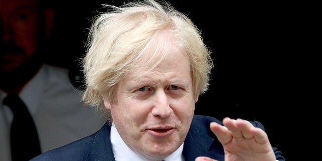 Britain's Prime Minister Boris Johnson leaves 10 Downing Street, in London, Tuesday June 16, 2020. (Yui Mok/PA via AP)