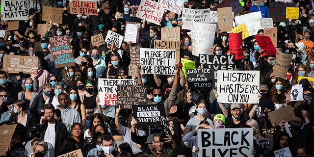 Thousands of people gather for a peaceful demonstration in support of George Floyd and Regis Korchinski-Paquet and protest against racism, injustice and police brutality, in Vancouver, on Sunday, May 31, 2020. (Darryl Dyck/The Canadian Press via AP)