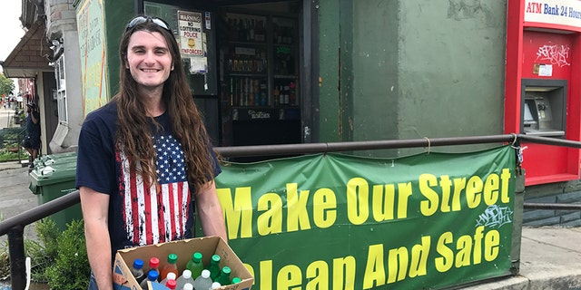 Conservative activist Scott Presler organized his first community cleanup in Baltimore after President Trump called it a “disgusting, rat and rodent infested mess.”