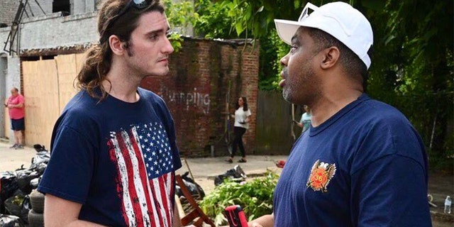 Presler helps volunteers register to vote during his cleanup events.