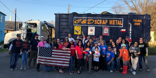 Volunteers took a group photo after cleaning up Houston.