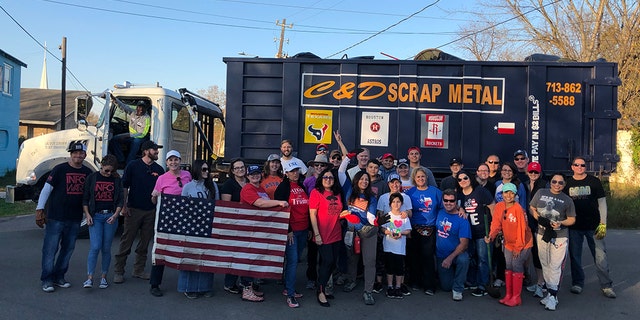 Volunteers took a group photo after cleaning up Houston.