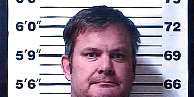 A booking photo provided by the Rexburg (Idaho) Police Department shows Chad Daybell, who was arrested Tuesday, June 9, 2020, on suspicion of concealing or destroying evidence after local and federal investigators searched his property, according to the Fremont County Sheriff’s Office.(Rexburg Police Department via AP)