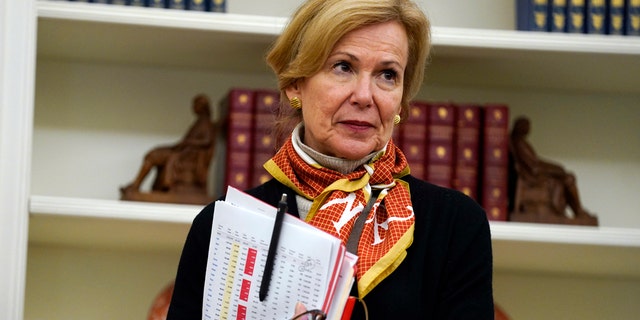White House coronavirus response coordinator Dr. Deborah Birx listens during an event in honor of World Nurses Day in the Oval Office of the White House, Wednesday, May 6, 2020, in Washington.