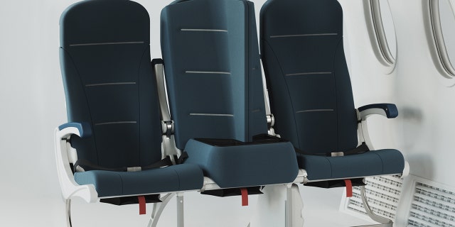 It features a chair back that can serve as a divider to separate the window and aisle seat.