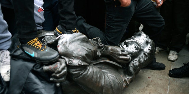 UK crowd tears down statue of 17th-century slave trader Edward ...