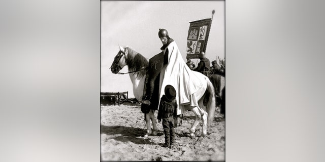Charlton Heston and his son on the set of 1961's 'El Cid.'