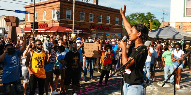Yasmin Pierce of Circuit Riders participating in a worship and prayer service at the site of George Floyd's memorial in Minneapolis, Minn.