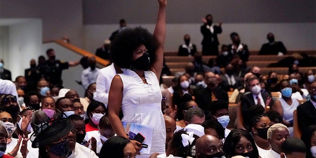 Family and guests attend the funeral service for George Floyd at The Fountain of Praise church Tuesday, June 9, 2020, in Houston.