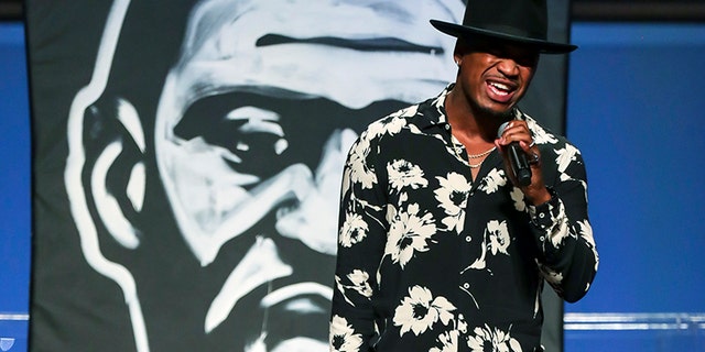 Singer Ne-Yo performs a song during the funeral for George Floyd on Tuesday, June 9, 2020, at The Fountain of Praise church in Houston.
